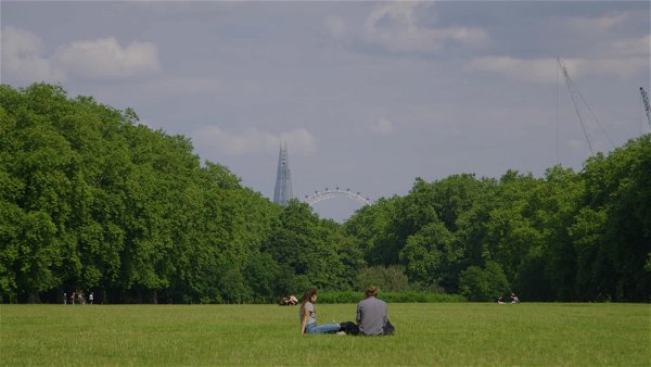 Couple in park London skyline.mp4
